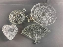 Group of Clear glass cake stand, candle holder and more