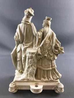 Porcelain figurine knight and queen