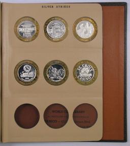 Lot of (42) .999 Silver Casino Gaming Tokens in Dansco Album 7003.