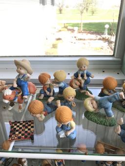 Shelf lot of enesco Country cousin porcelain figurines