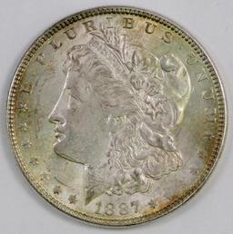 1887 P Morgan Silver Dollar.