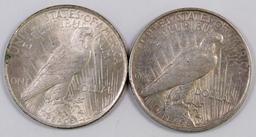 Lot of (2) Peace Silver Dollars.