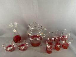 Group of 10 ruby flash glass items with floral design