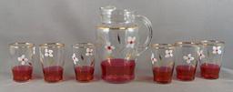 Vintage seven piece glass of lemonade set with ruby flash and hand painted floral design