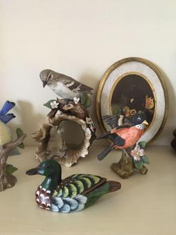 Shelf lot of porcelain birds and more