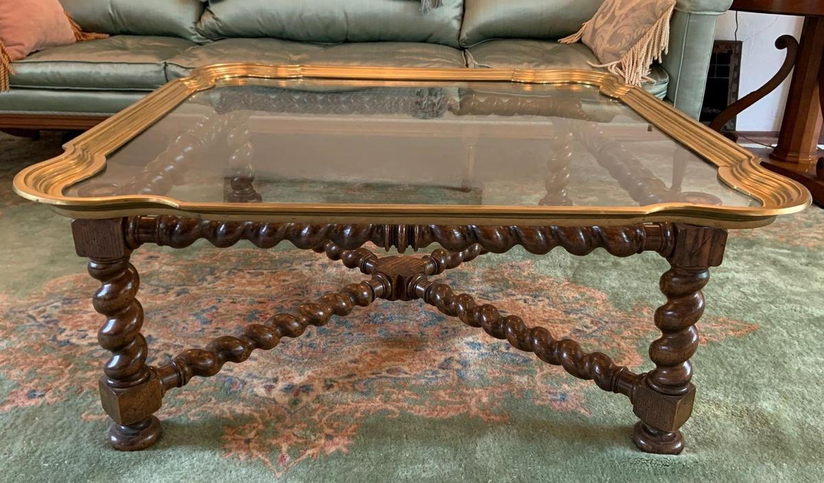 Antique coffee table with turned legs and glass