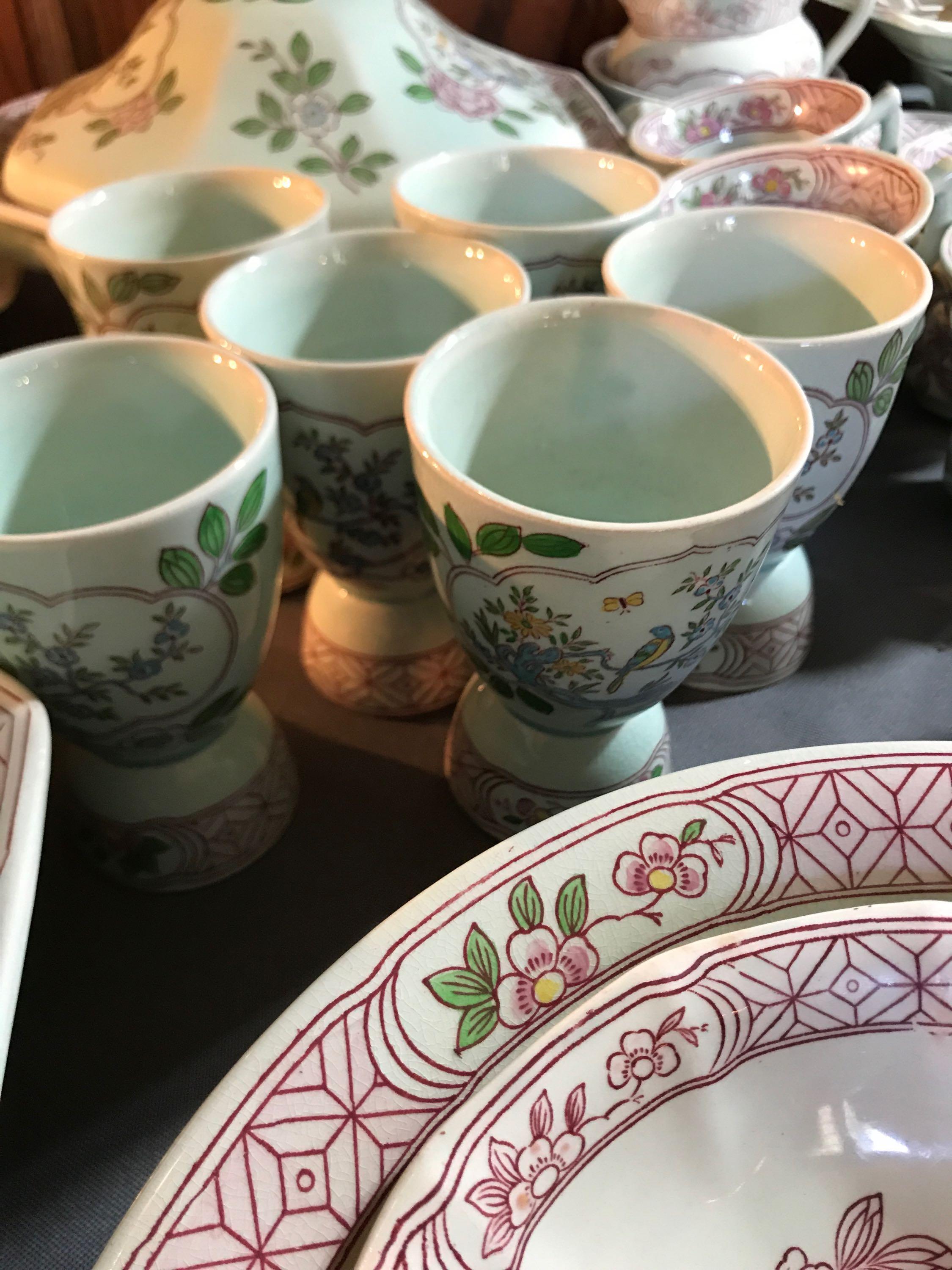 Large group of vintage Calyx Ware Singapore bird dishes