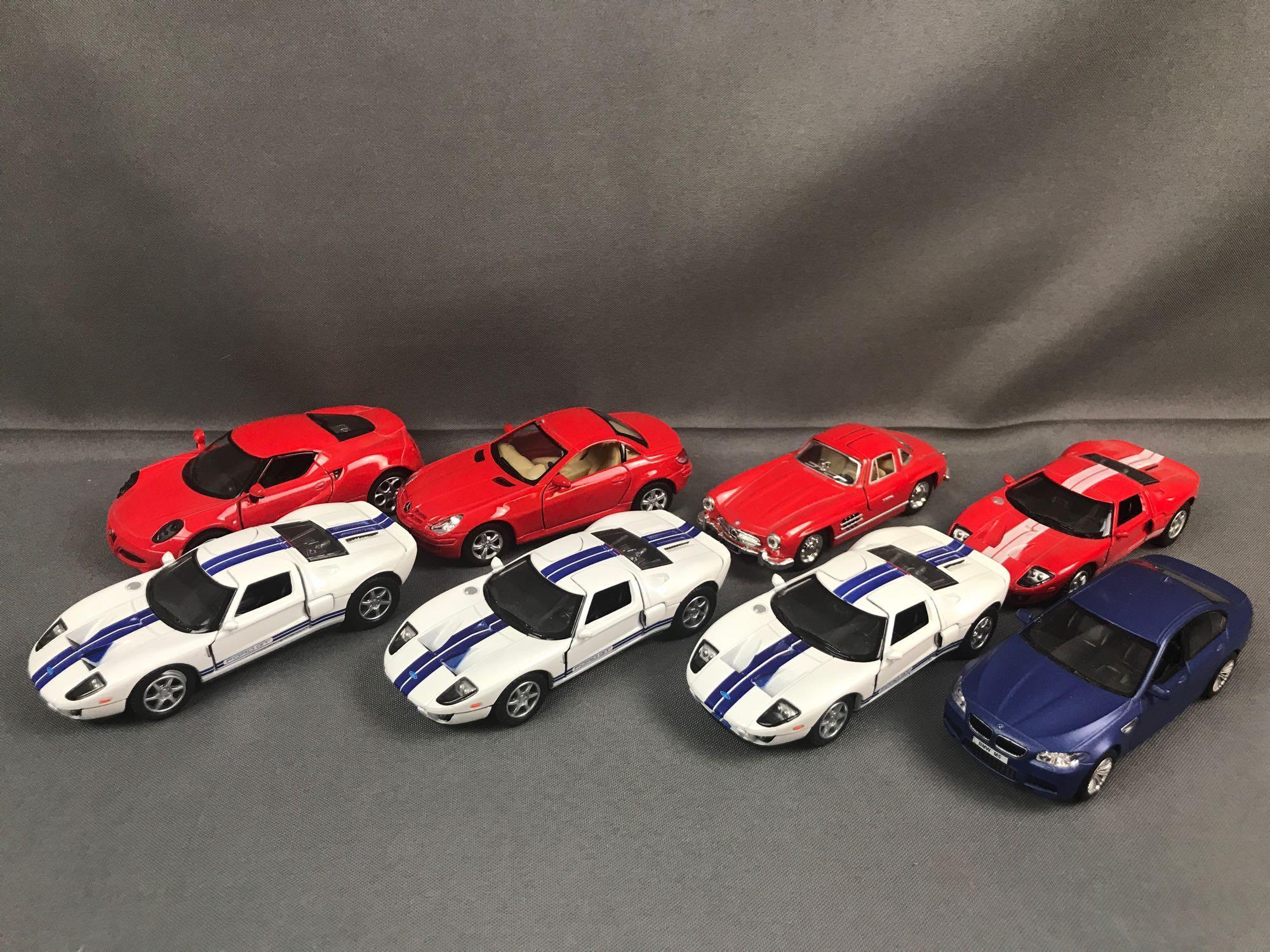 Group of 12 1:36 scale die-cast model cars