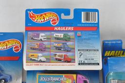 Group of 8 Hot Wheels Haulers Die-Cast Vehicles in Original Packaging