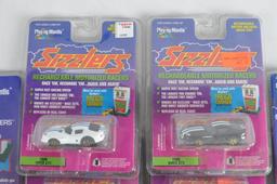Group of 12 Playing Mantis Sizzlers Die-Cast Vehicles with Mega Charger