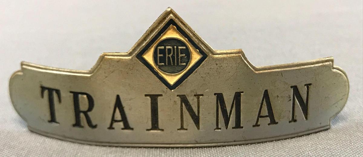 Vintage Erie railroad trainman hat badge