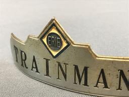 Vintage Erie railroad trainman hat badge