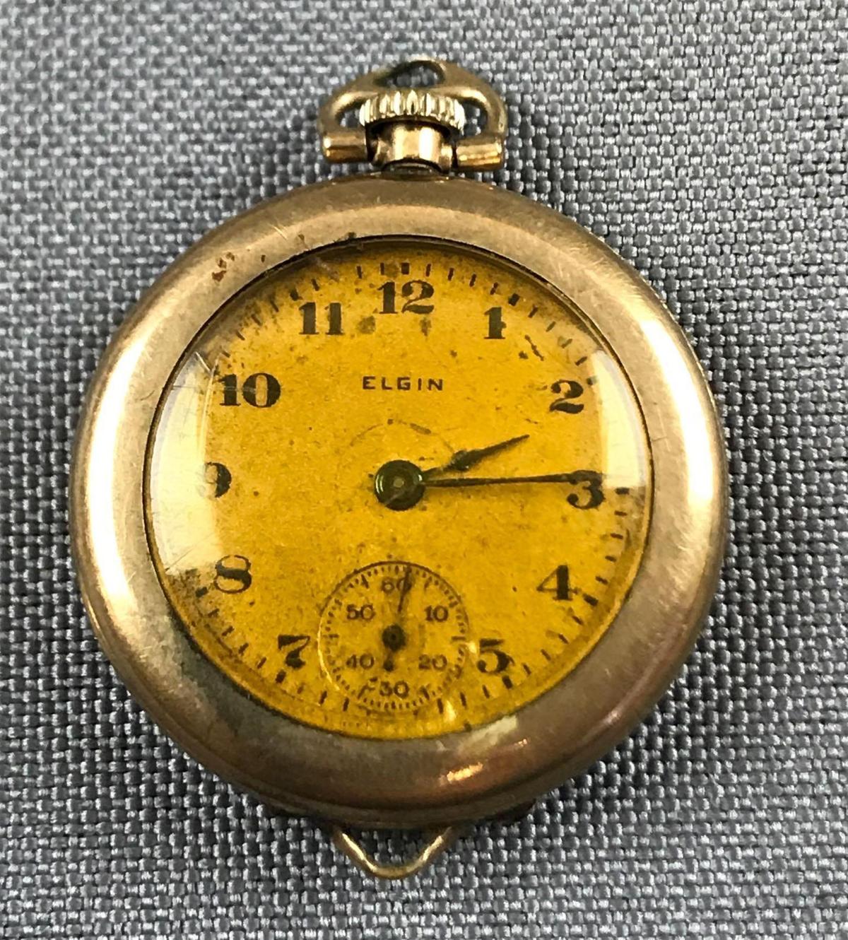 Vintage Elgin Pocket World