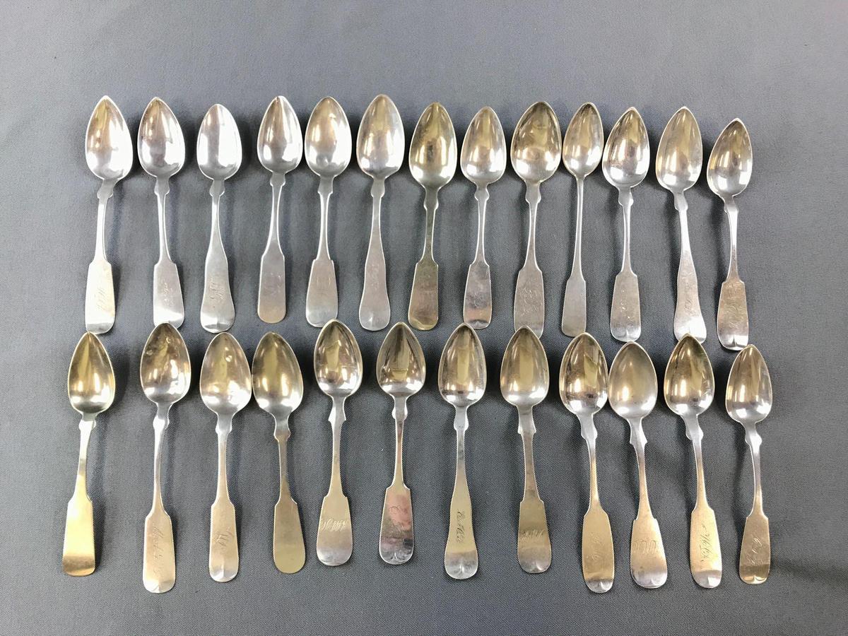 Group of 25 antique sterling or coin silver fiddleback spoons