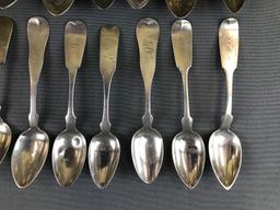 Group of 25 antique sterling or coin silver fiddleback spoons