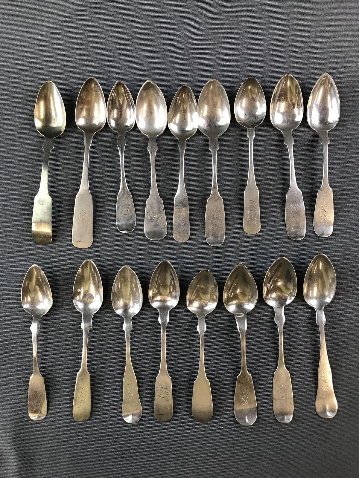 Group of 17 antique sterling or coin silver fiddleback spoons