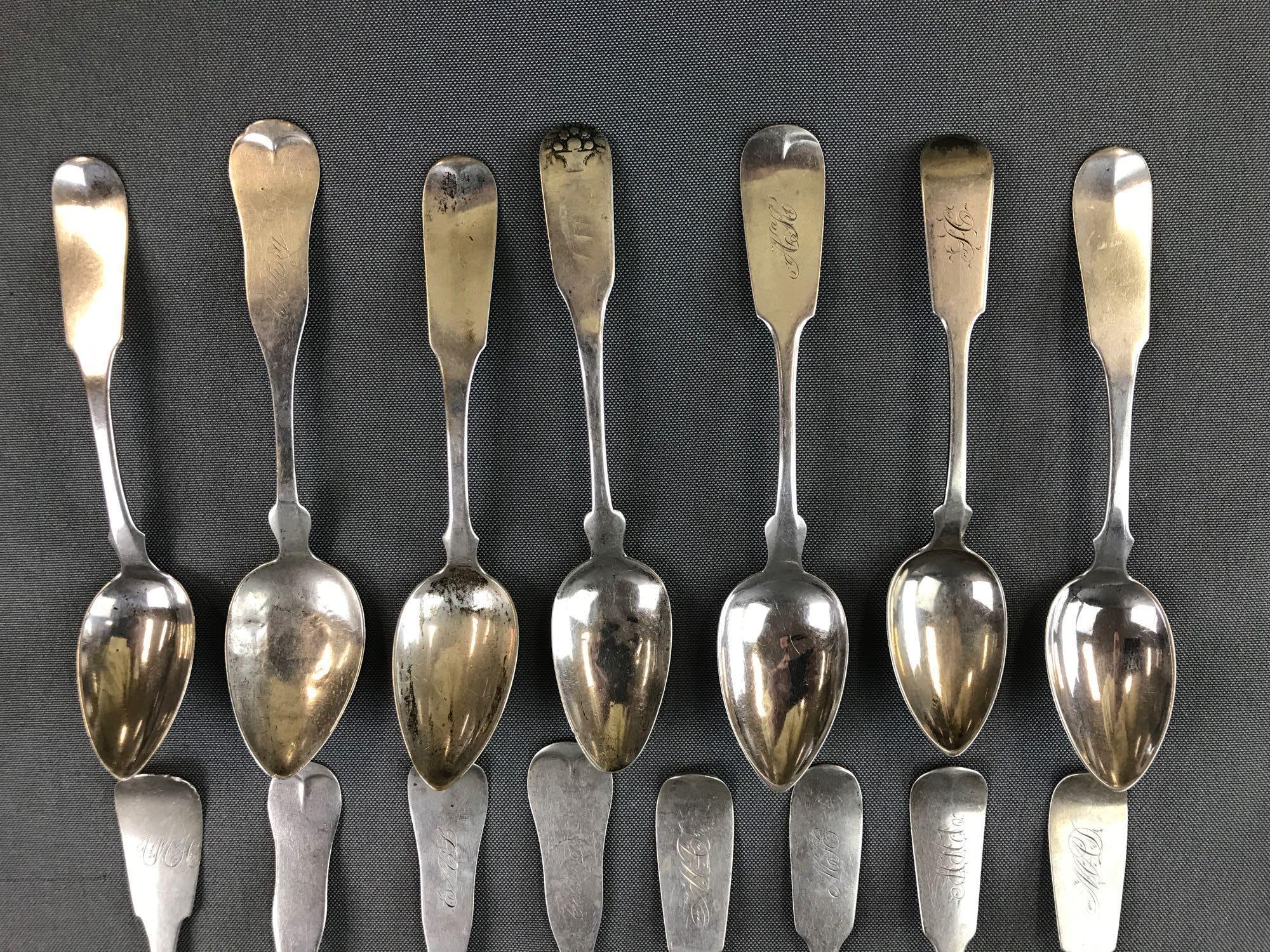 Group of 15 antique sterling or coin silver fiddleback spoons