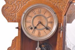 Antique Ansonia Clock Co. Oak Kitchen Clock with Ornate Cravings