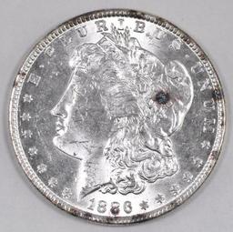 1886 P Morgan Silver Dollar.