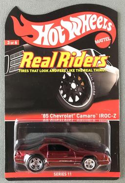 Hot Wheels Real Riders 1985 Chevy Camaro IROC-Z die-cast vehicle in original packaging