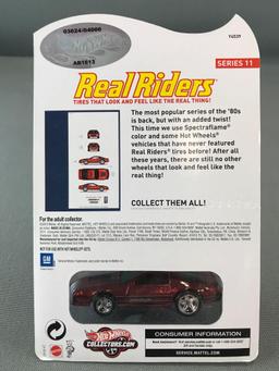 Hot Wheels Real Riders 1985 Chevy Camaro IROC-Z die-cast vehicle in original packaging