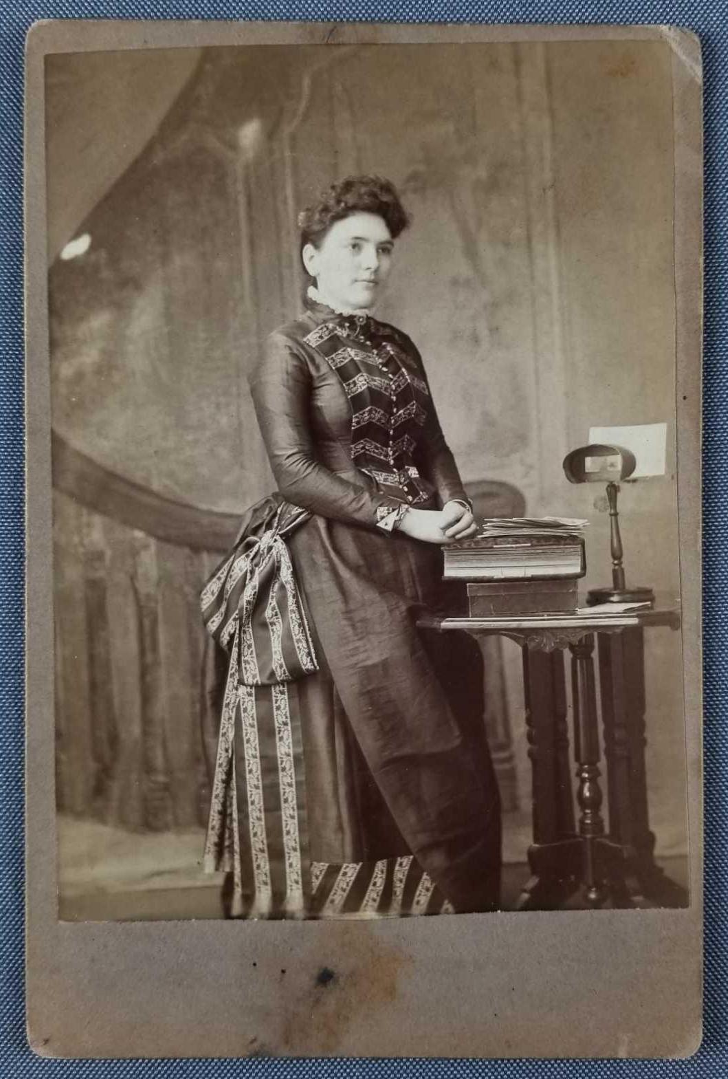 Antique photograph of woman with stereoscope