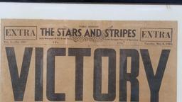 The Stars and Stripes daily newspaper of US armed forces, framed