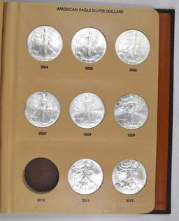 Dansco Album containing (30) 1oz. American Silver Dollars BU