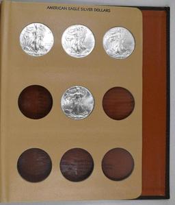 Dansco Album containing (30) 1oz. American Silver Dollars BU