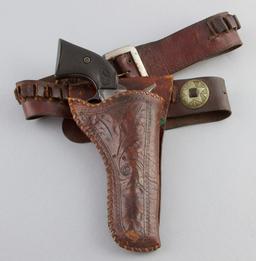 Vintage, floral carved Holster with Cartridge Belt.  Holster appears to have been modified from a lo