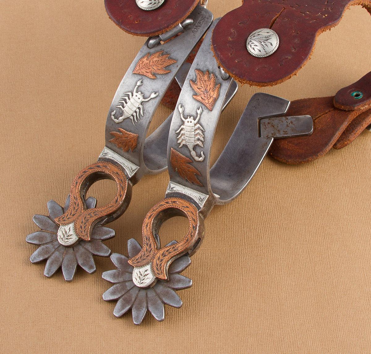 Pair of Ronnie Jones marked, double mounted Spurs with hand engraved silver and copper overlay in sc