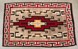 Beautiful early Navajo Rug,  measuring 48" x 75", very unique geometric designs with rich red colors