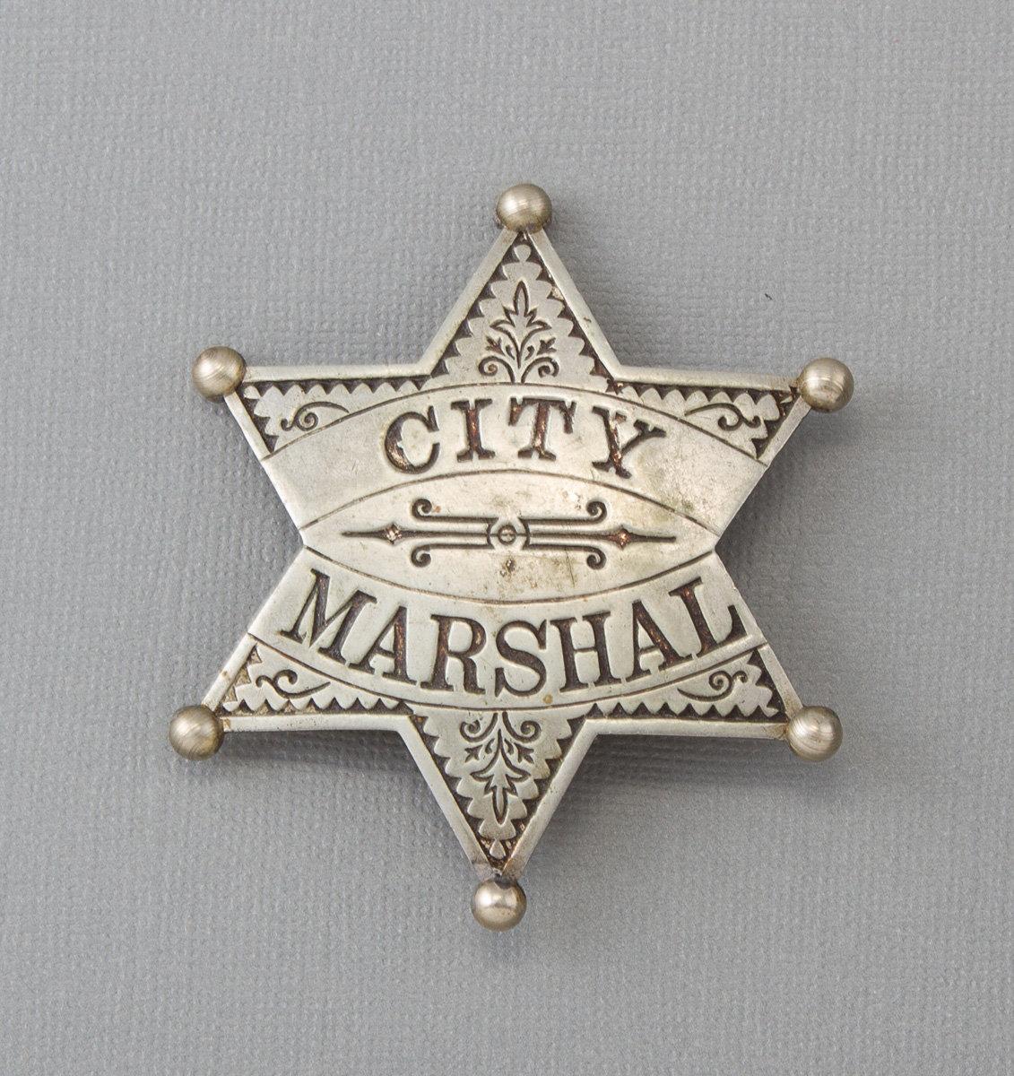 Ornate City Marshal Badge, six point ball star, 2 5/8" across points, turn of the century.  George J
