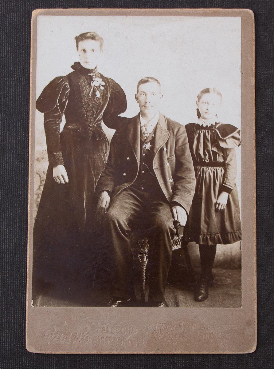 Early Rail Car Photo, circa 1880s with City Marshal and Family.  City Marshal is wearing an uncommon