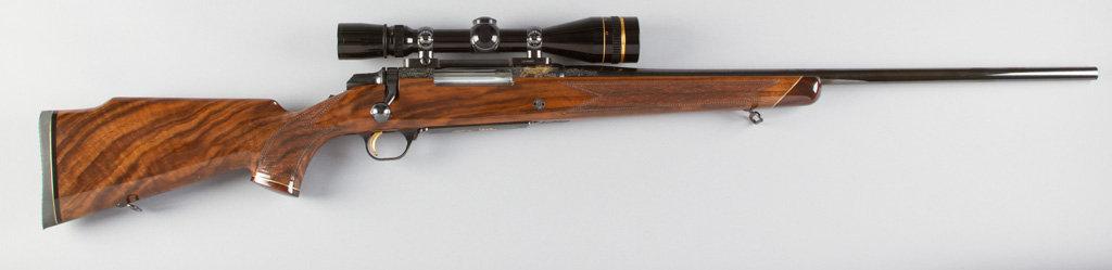 Cased Browning, BBR, 7MM Caliber, SN 00173PX617, 24" barrel, blue finish, factory engraved with gold