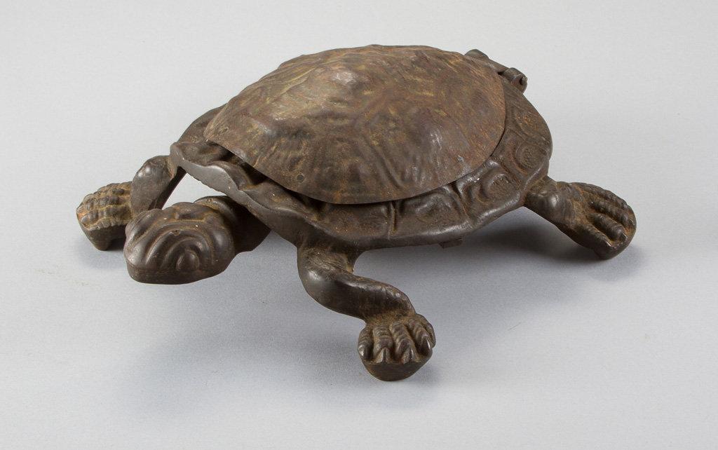 Early and unusual , heavy cast iron Turtle Spittoon, circa 1880-1890, with original oval, cast iron