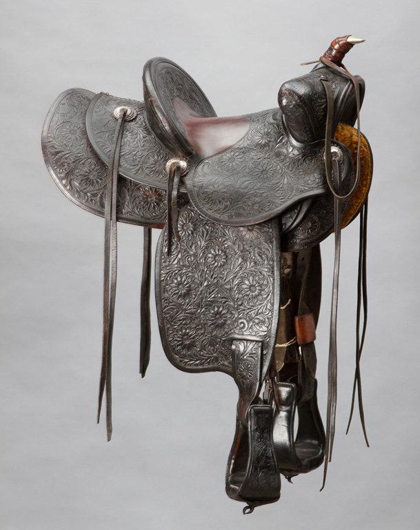 Beautiful, highly tooled Saddle, marked "Edward H. Bohlin, Maker, Hollywood, Cal.", 12" seat, 4" can