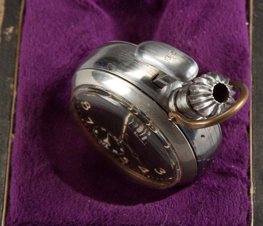 Cased Curio Pocket Watch / Gun, watch is marked "Tower", in silver case with trigger on left side of