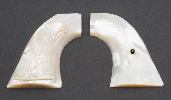 Extremely fine pair of two-piece, raised carved Mother of Pearl Grips for Colt SAA Revolver.  Right