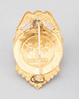 Deputy Sheriff Badge, shield with eagle crest, 2 3/4" T, gold plate.  George Jackson Collection.