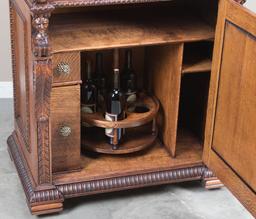 Heavily carved antique oak Home Bar, circa 1900, attributed to R.J. Horner, 49" T x 31 1/2" W x 20"