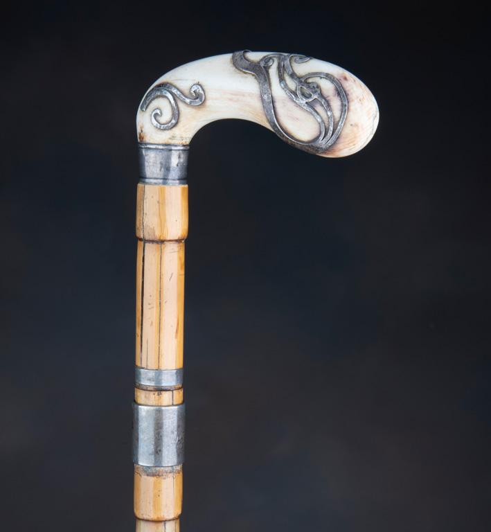 Vintage Walking Cane with bamboo style shaft, 35" long, with silver spacers and silver mounted ivory