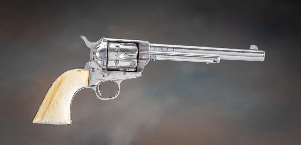Attractive antique Colt, SAA Revolver, etched panel, .44 ,40 caliber, ivory stocks.  This 6-shot rev