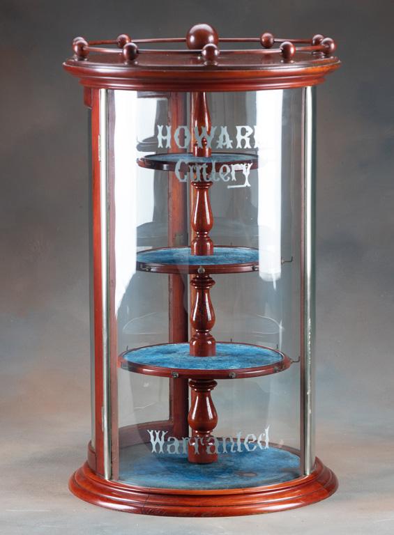 Antique revolving, curved glass, counter top Display Case, manufactured by "C.B. Barker and Co., Cut