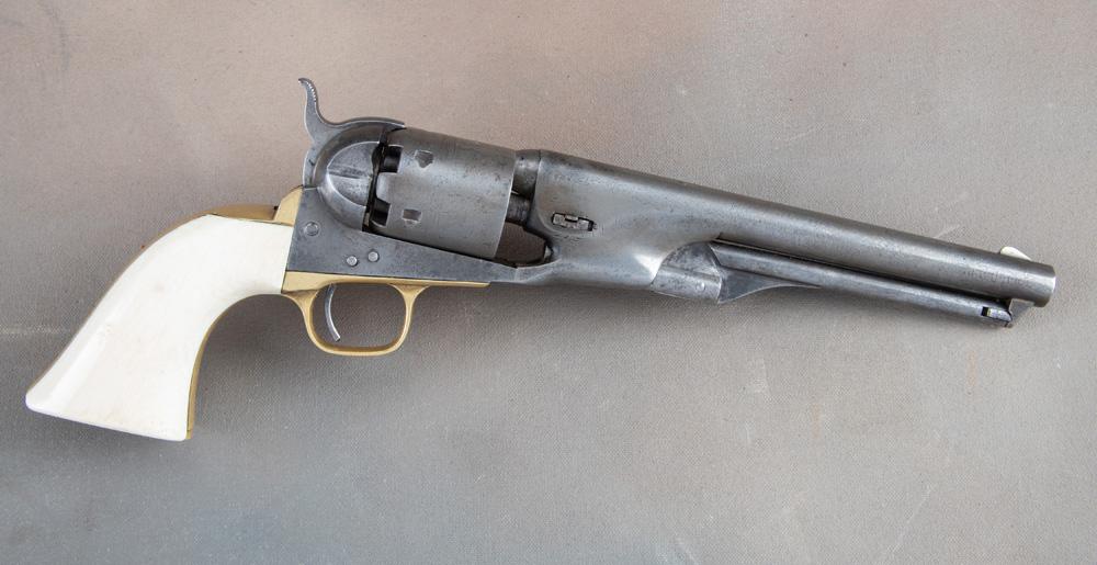 Early antique Colt, 1861 Navy Revolver with ivory stocks.  SN 7206 matches on the barrel, frame, tri