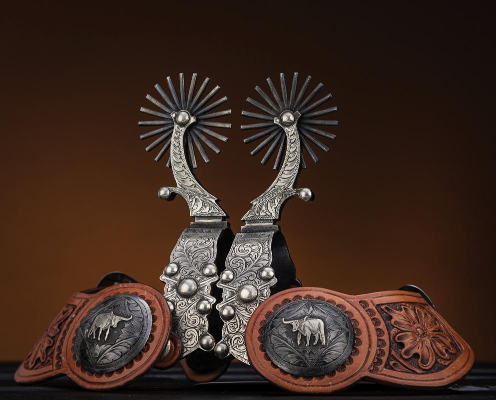 Fantastic pair of double mounted, hand engraved, silver overlay Spurs by noted West Bountiful, Utah