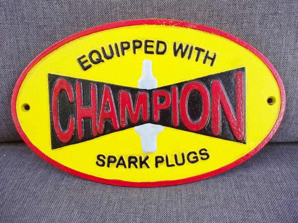Cast Iron Equipped with Champion Spark Plugs Dealer Sign