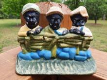 Cast Iron Hubley Black Americana 3 Boys on Fence Eating Melon Doorstop