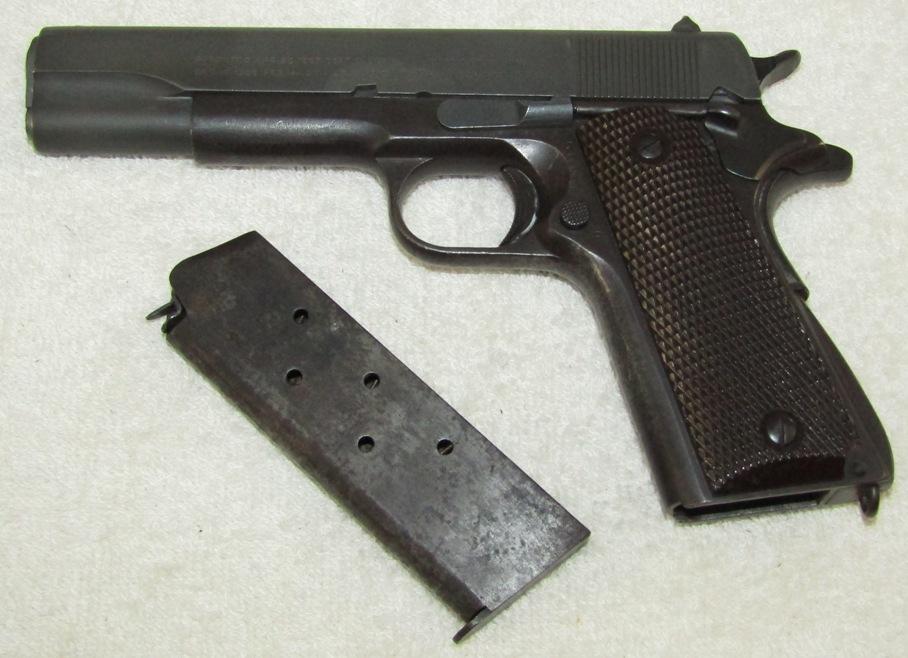 WW2 Late War Colt M1911A1 .45 Pistol With Clip