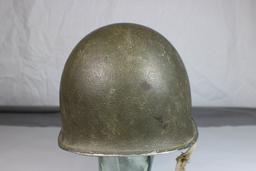 US WW2 Front Seam Fixed Bale M1 Helmet W/ Liner. Some Damage.